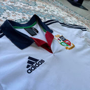 Adidas men's polo shirt red with British and Irish Lions logo and embroidered details.