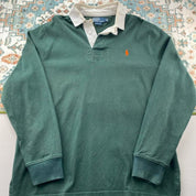Polo Ralph Lauren green rugby polo shirt with embroidered logo and thick cotton material.