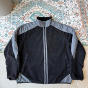 Oakley fleece jacket in cream with embroidered spellout logo and soft sherpa texture.