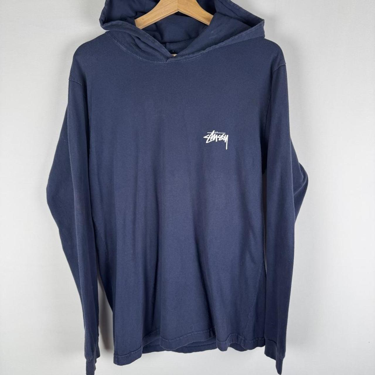 Stüssy grey hoodie with back print spellout logo, slim fit, cotton material.