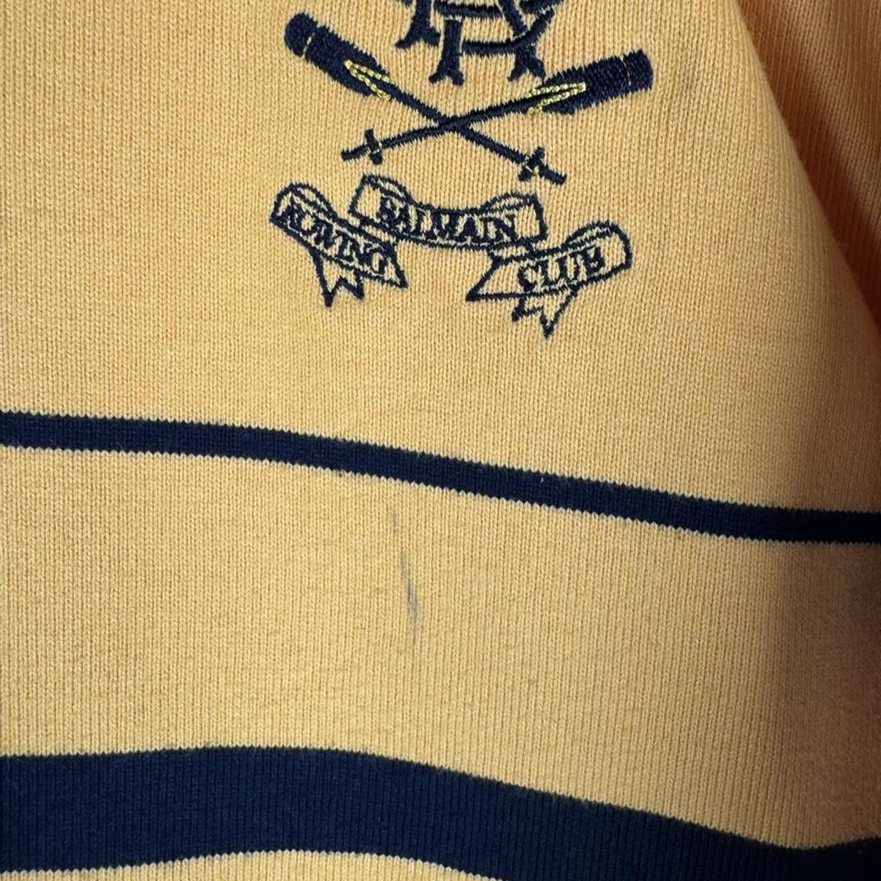 Canterbury men's rugby polo shirt navy blue with embroidered Balmain Rowing Club logo.