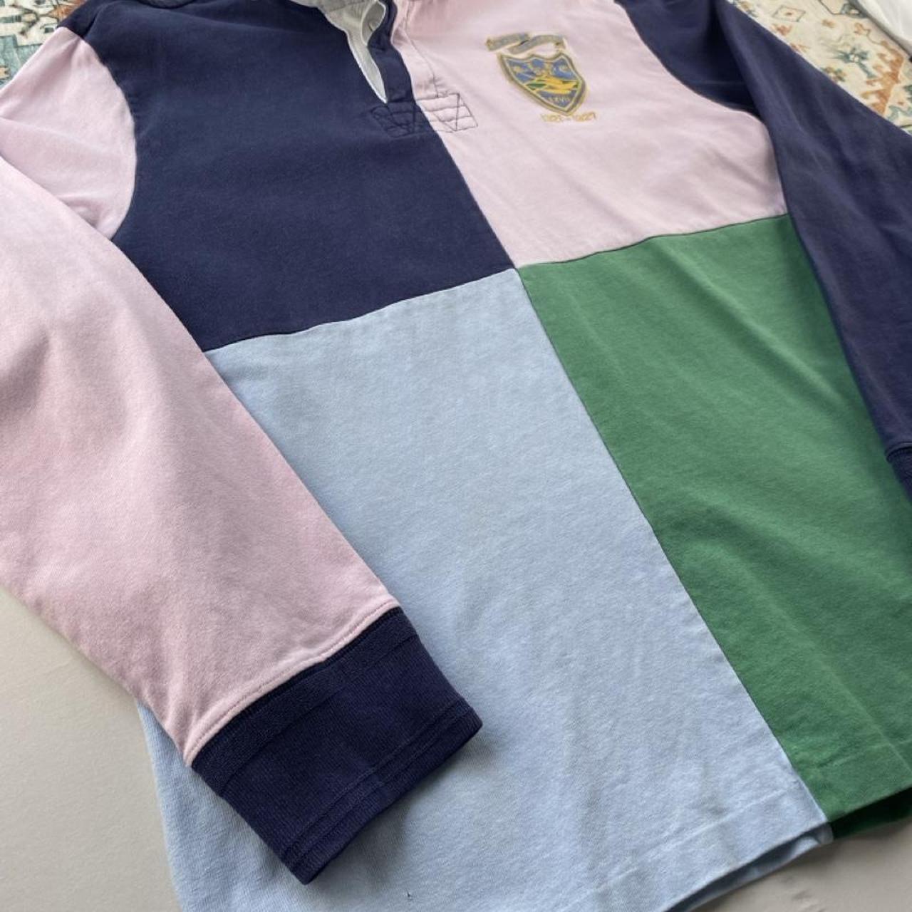 Polo Ralph Lauren men's rugby polo shirt green and navy quarter panel design, embroidered logo.