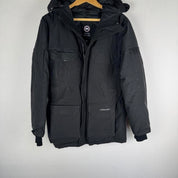 Canada Goose black parka jacket oversized fit with utility pockets and logo patch.