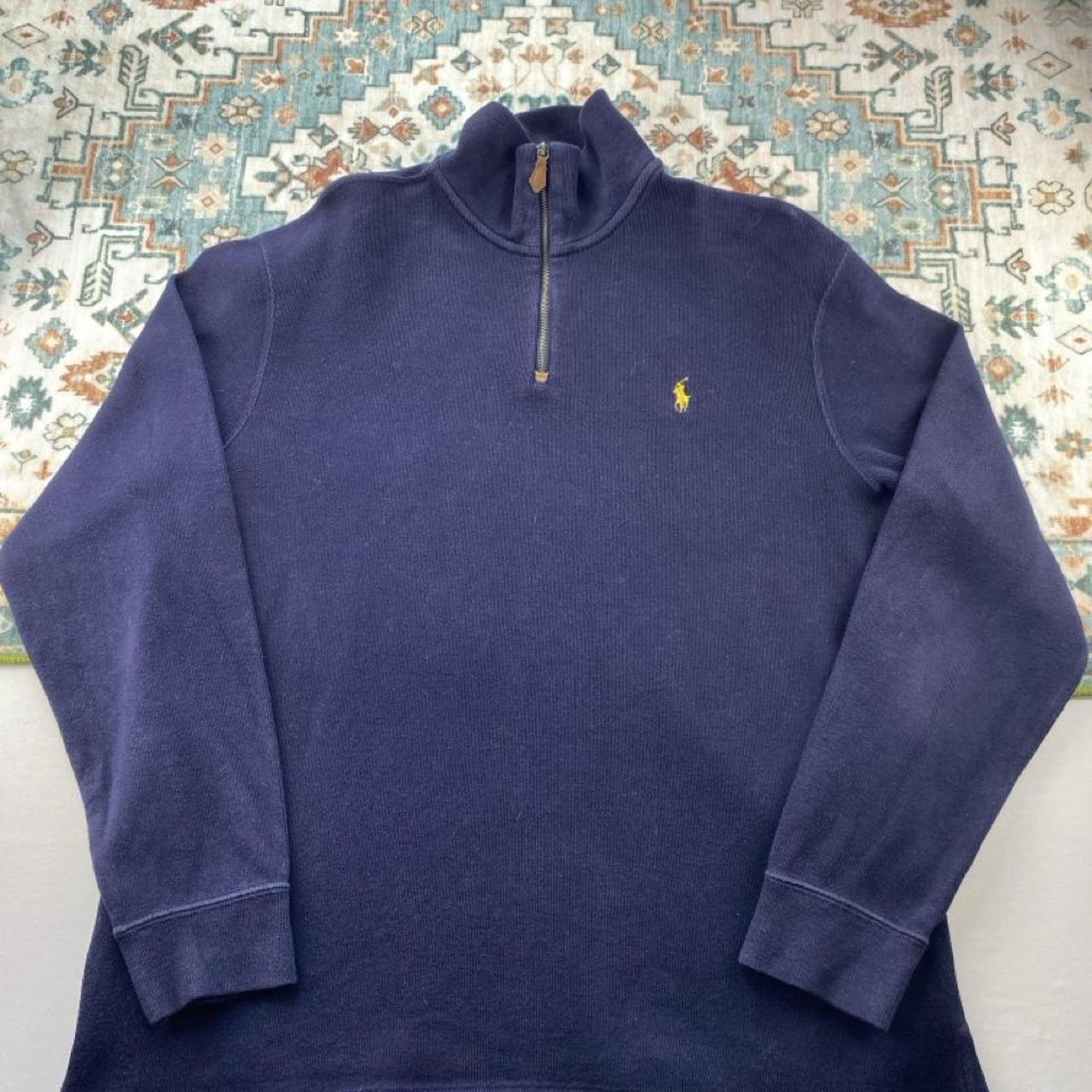 Polo Ralph Lauren navy jumper with embroidered pony logo and quarter zip detail.