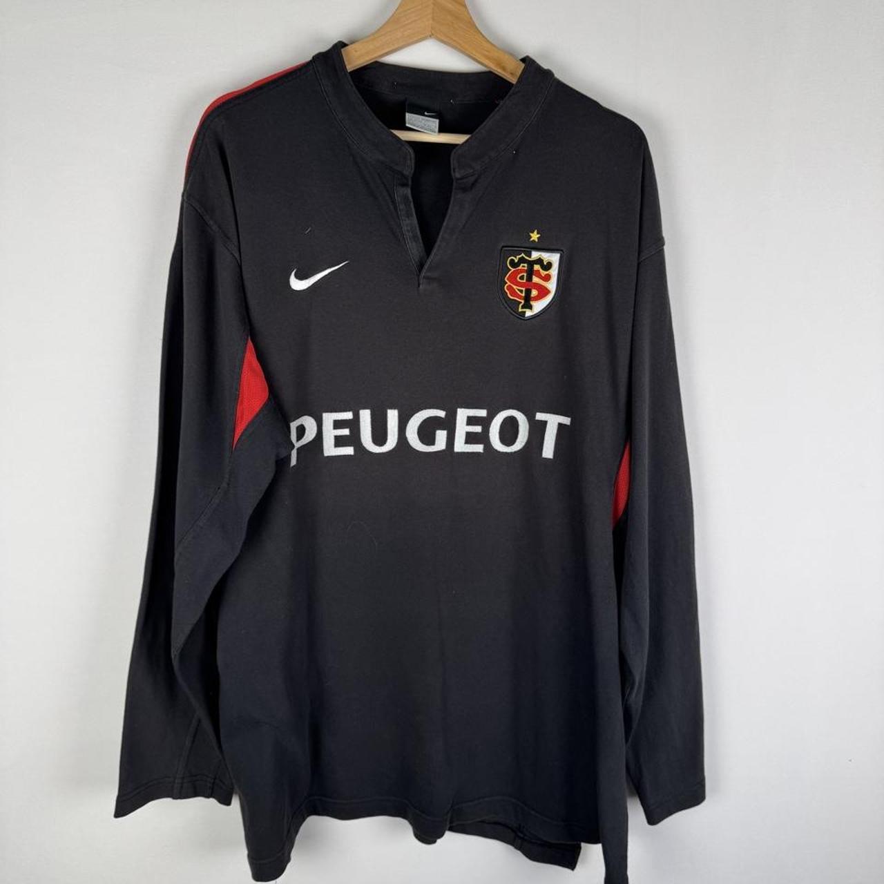 Nike men's rugby polo shirt red with Stade Toulousain logo and oversized fit.