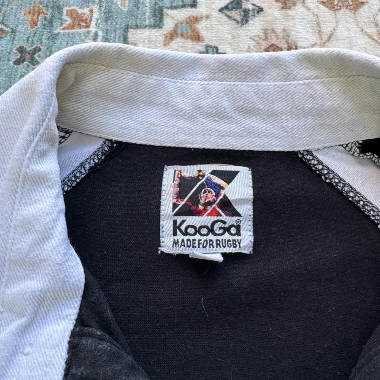 Kooga men's polo shirt, green with embroidered New Zealand logo and rugby collar.