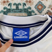 Umbro England home jersey, red with white logo and classic football design.