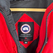 Canada Goose black Montebello parka jacket with fur-lined hood and logo patch.
