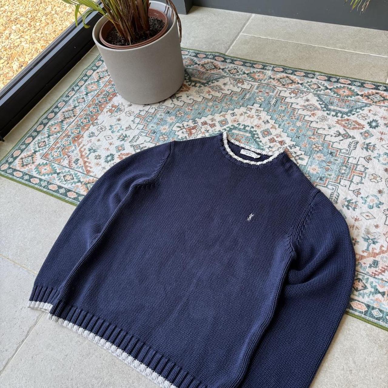 Yves Saint Laurent navy sweatshirt with white trim and embroidered YSL logo.