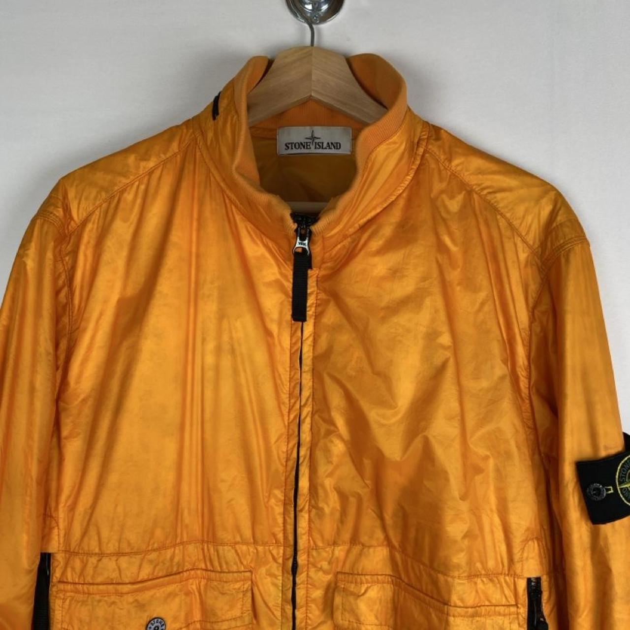 Stone Island bomber jacket in green with logo patch and micro ripstop material.