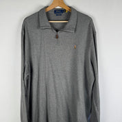 Polo Ralph Lauren oversized quarter zip fleece in navy blue with ribbed texture.