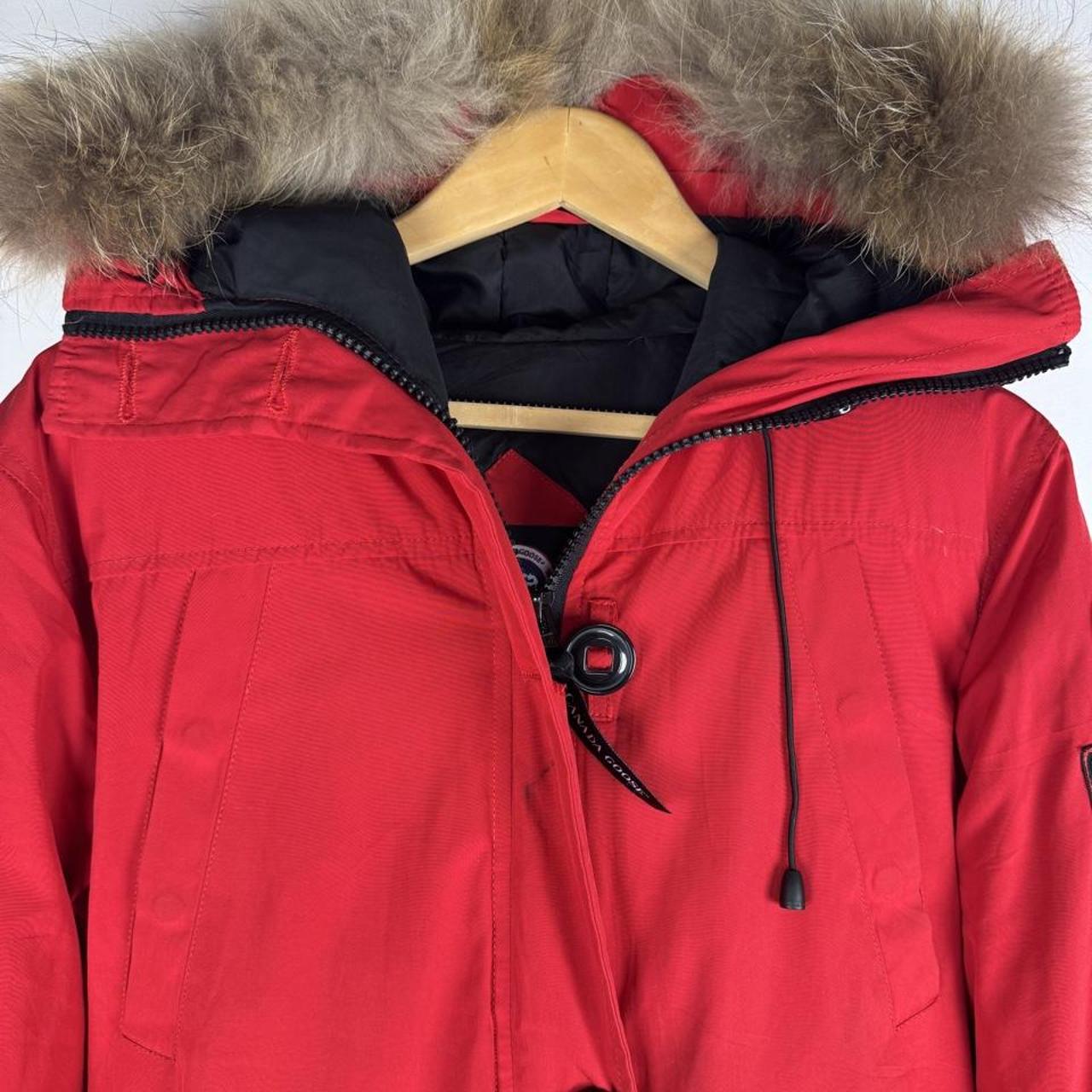 Canada Goose black Montebello parka jacket with fur-lined hood and logo patch.