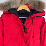 Canada Goose black Montebello parka jacket with fur-lined hood and logo patch.