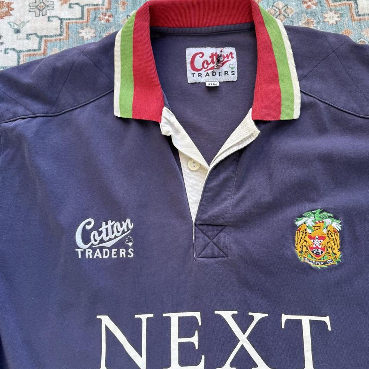 Cotton Traders men's rugby polo shirt, navy with fading, featuring Tigers logo and cotton material.
