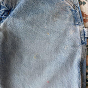 Carhartt denim baggy shorts blue with classic logo and carpenter pockets.