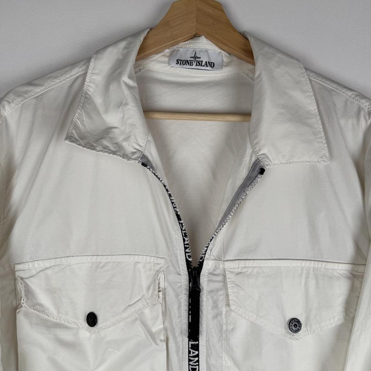 Stone Island shell jacket XL, black with logo trim and lightweight material.