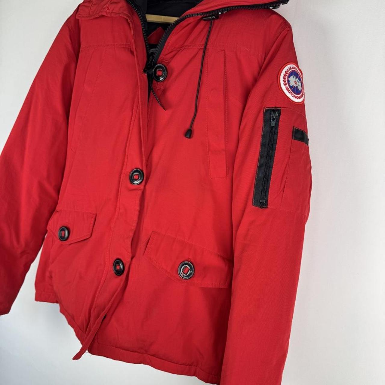 Canada Goose black Montebello parka jacket with fur-lined hood and logo patch.