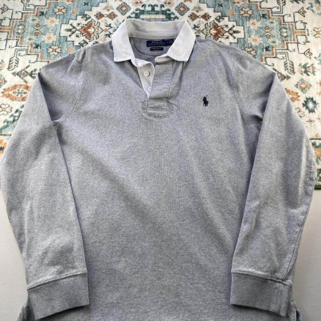 Polo Ralph Lauren grey rugby polo shirt with embroidered logo and classic collar.
