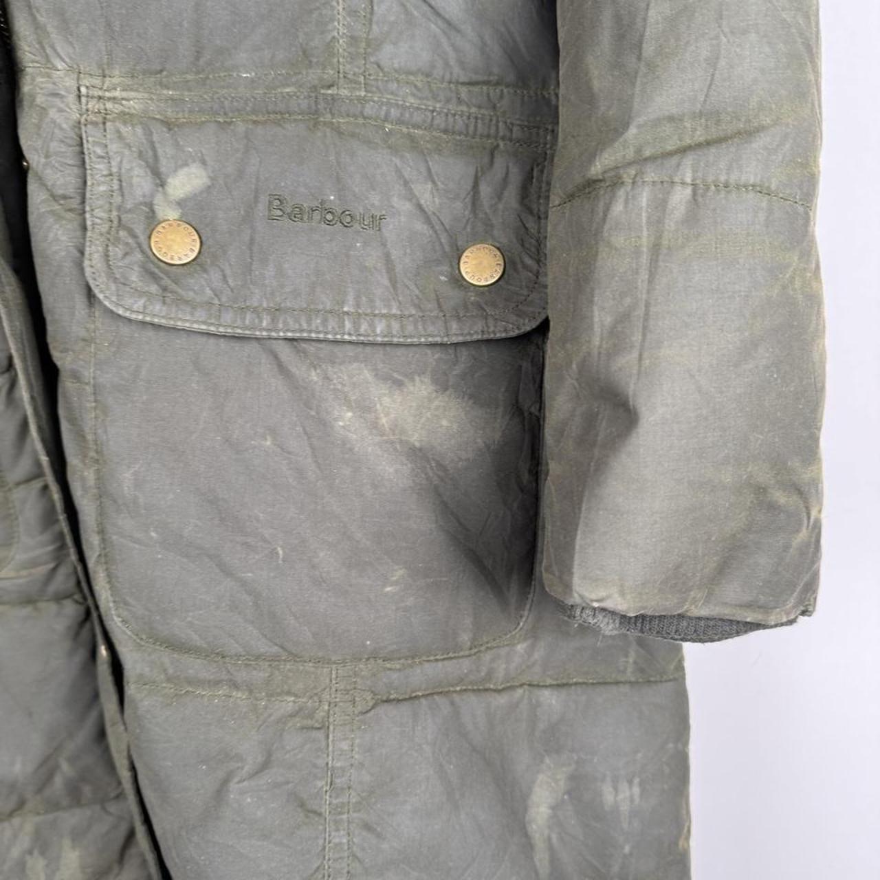 Barbour khaki women's thick down jacket with logo and signs of wear.