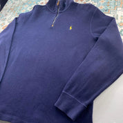 Polo Ralph Lauren navy jumper with embroidered pony logo and quarter zip detail.