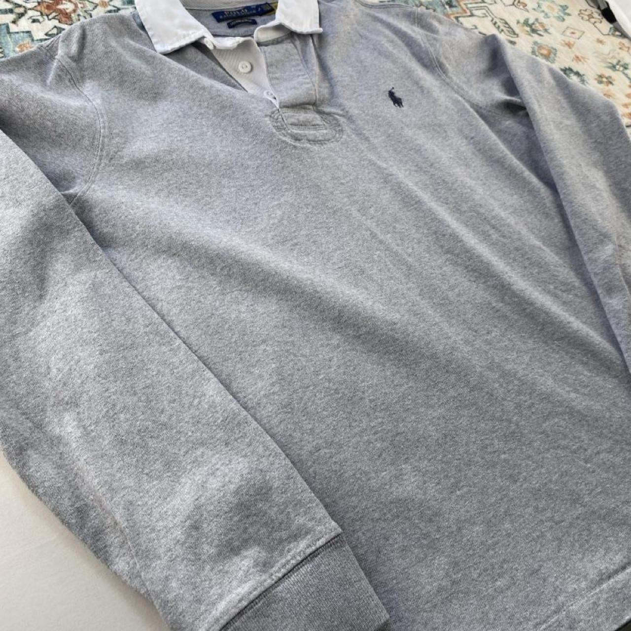 Polo Ralph Lauren grey rugby polo shirt with embroidered logo and classic collar.