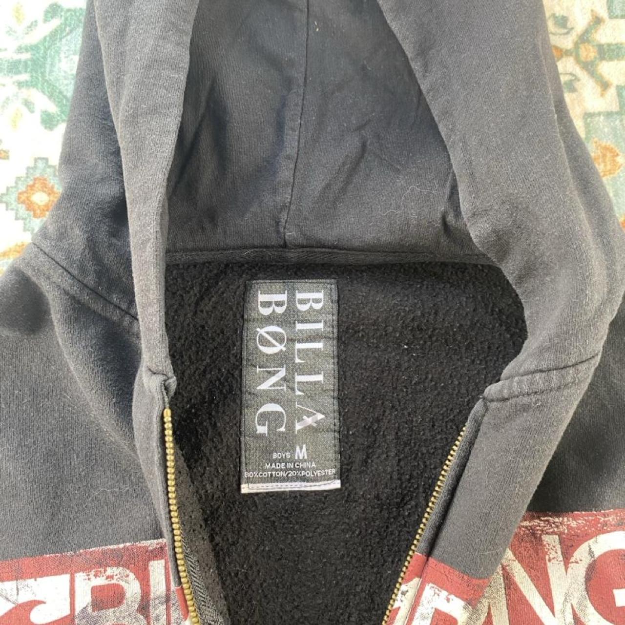 Billabong full zip hoodie for boys, navy blue, featuring logo and soft cotton material.