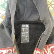 Billabong full zip hoodie for boys, navy blue, featuring logo and soft cotton material.