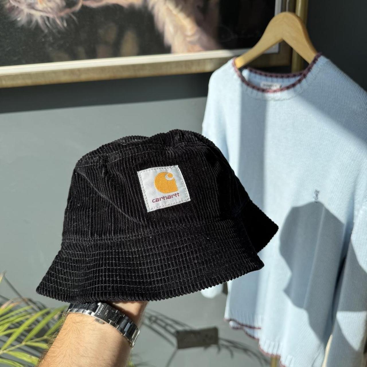 Carhartt WIP bucket hat brown corduroy with embroidered logo detail.