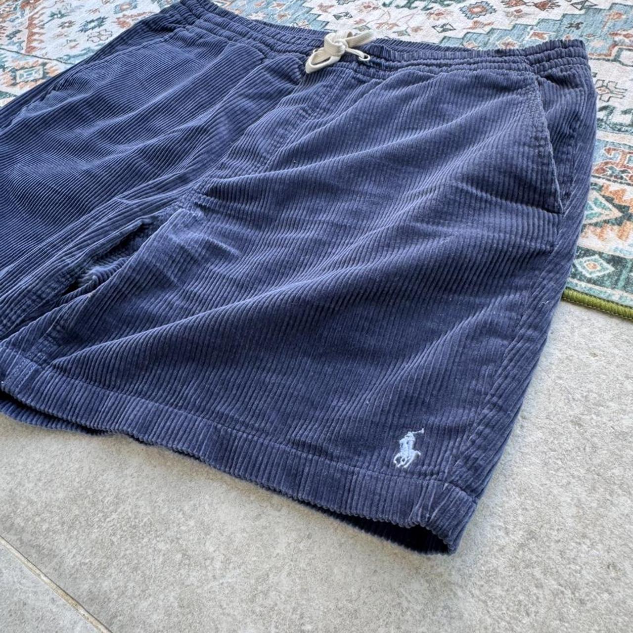 Polo Ralph Lauren navy corduroy shorts with embroidered logo and classic fit.