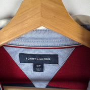 Tommy Hilfiger striped rugby polo shirt with embroidered spellout logo in navy and white.