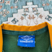 Umbro men's polo shirt green with Wallabies logo and rugby league pattern.
