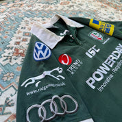 ISC green rugby polo shirt with embroidered London Irish logo and slim fit.