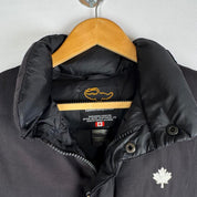 Canada Goose black down filled gilet with logo patch and zip pockets.