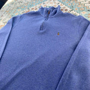 Polo Ralph Lauren light blue quarter zip fleece with embroidered logo and soft texture.