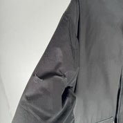 Canada Goose battered jacket black with no fur, badge, or visible holes.