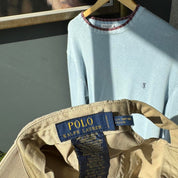 Polo Ralph Lauren tan cap with embroidered logo and adjustable strap.
