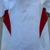 Nike England rugby polo shirt, red with embroidered logo and white collar details.