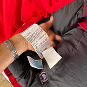 Canada Goose black Montebello parka jacket with fur-lined hood and logo patch.