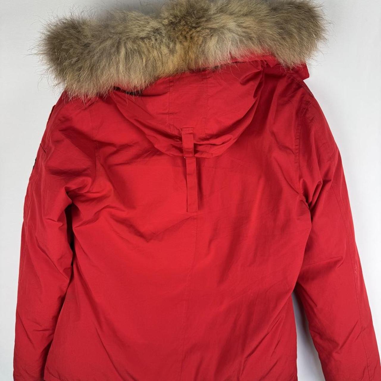 Canada Goose black Montebello parka jacket with fur-lined hood and logo patch.