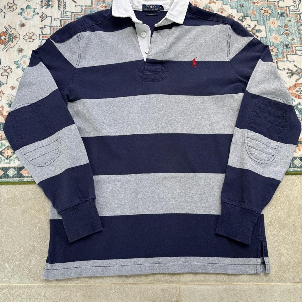 Polo Ralph Lauren navy rugby polo shirt with thick stripes and embroidered logo.