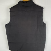 Canada Goose black down filled gilet with logo patch and zippered pockets.