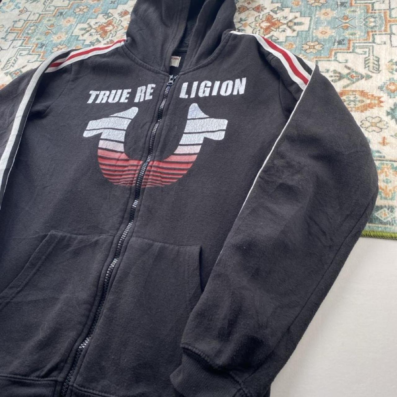 True Religion black and white full zip hoodie with logo and contrast stitching.
