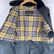 Barbour cream lightweight jacket with logo detail and slim fit design.