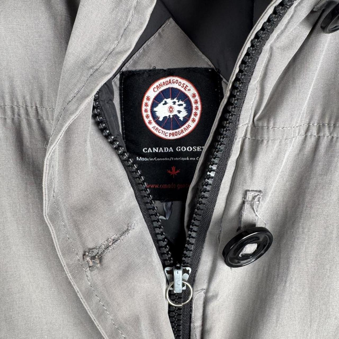 Canada Goose black Montebello parka jacket with fur-lined hood and logo patch.