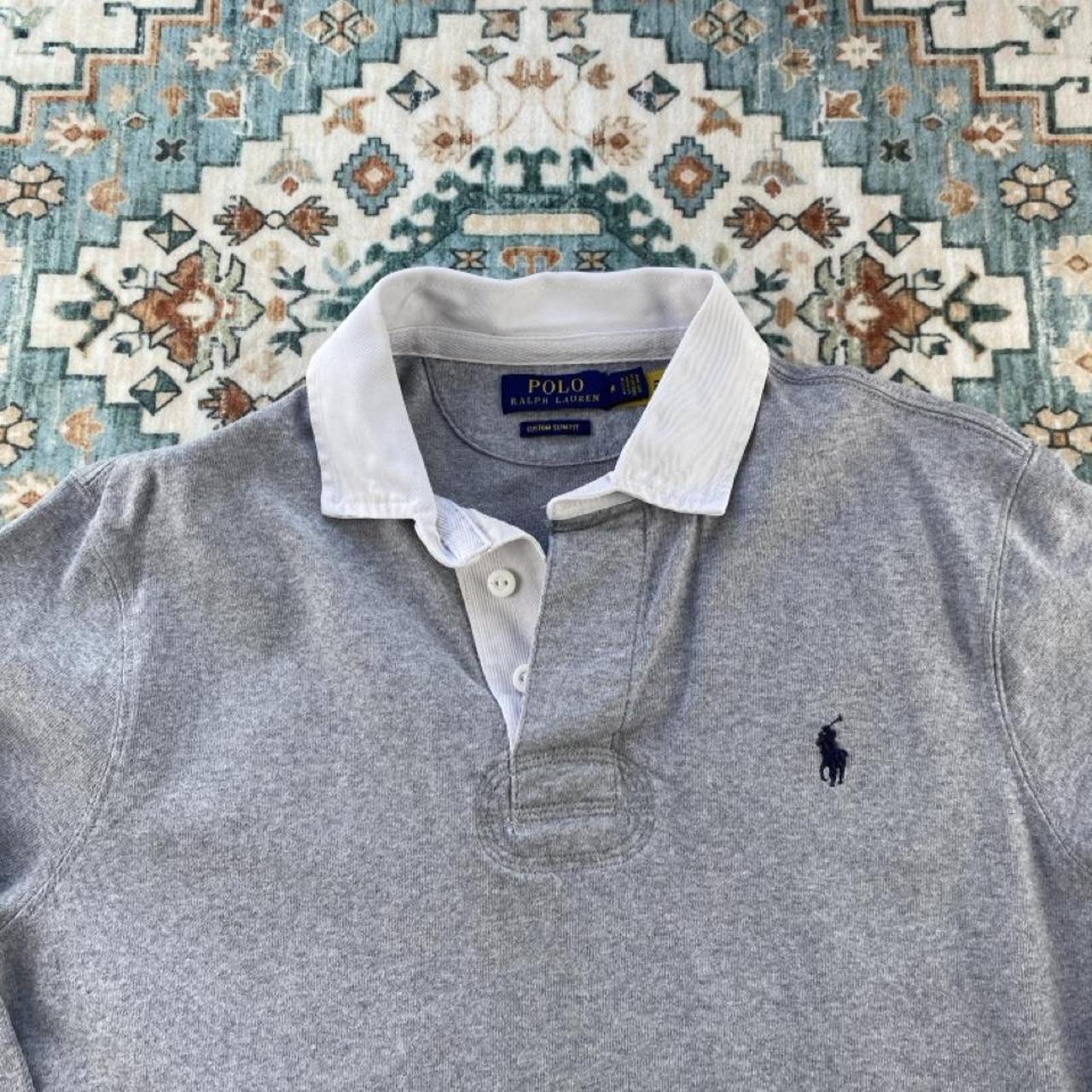 Polo Ralph Lauren grey rugby polo shirt with embroidered logo and classic collar.