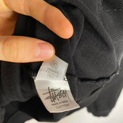 Stüssy grey hoodie with NYC centre print and backprint, relaxed fit.