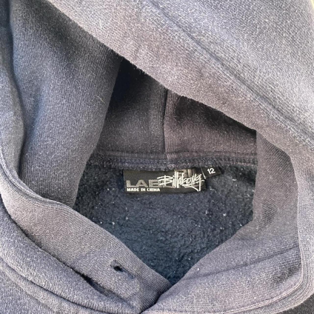Billabong navy oversized hoodie with logo detail and soft material.