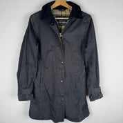 Barbour cream lightweight jacket with logo detail and slim fit design.