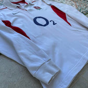 Nike long sleeve polo shirt in navy blue with embroidered England Rugby logo.