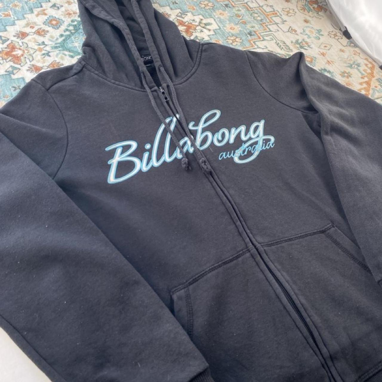 Billabong black oversized full zip hoodie with logo detail and soft material.